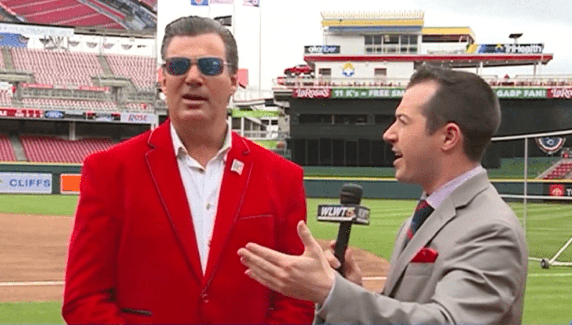 Brandon Saho standing next to Reds Owner Bob Castellini